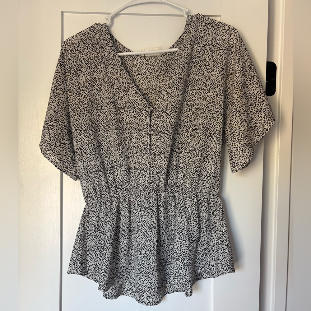 Sienna Sky Black and White Blouse
Size medium